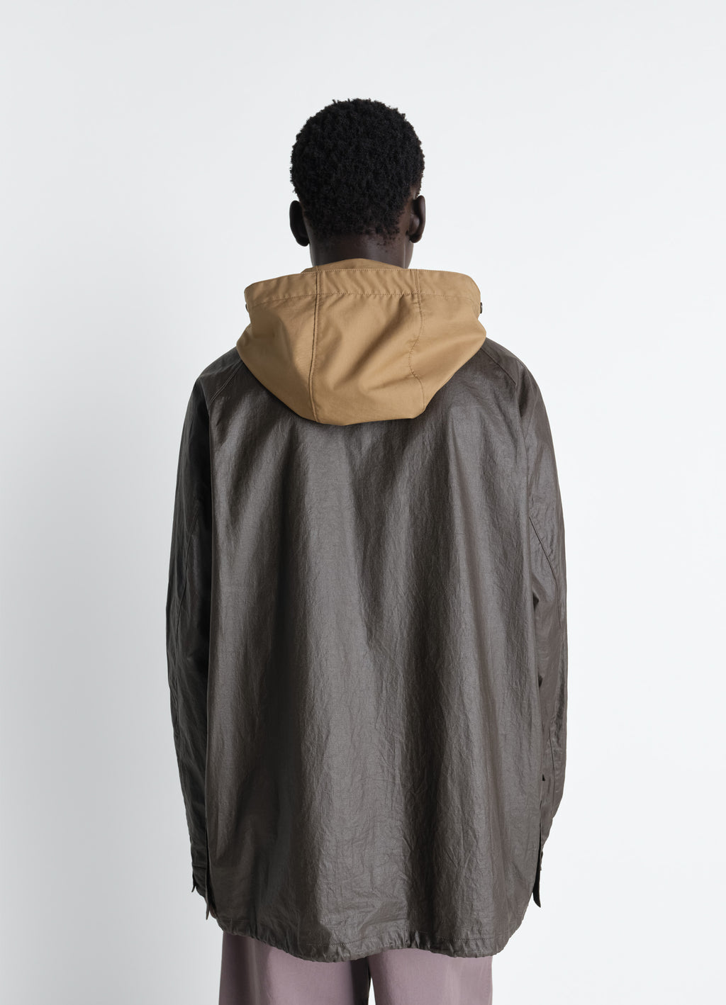 Rain jacket with detachable hood in coated technical linen