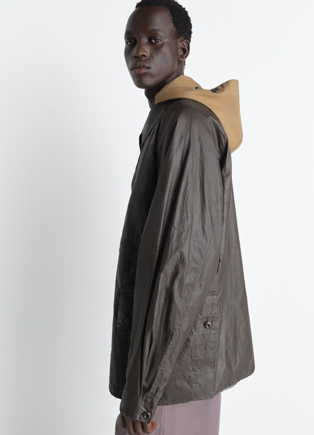 Rain jacket with detachable hood in coated technical linen