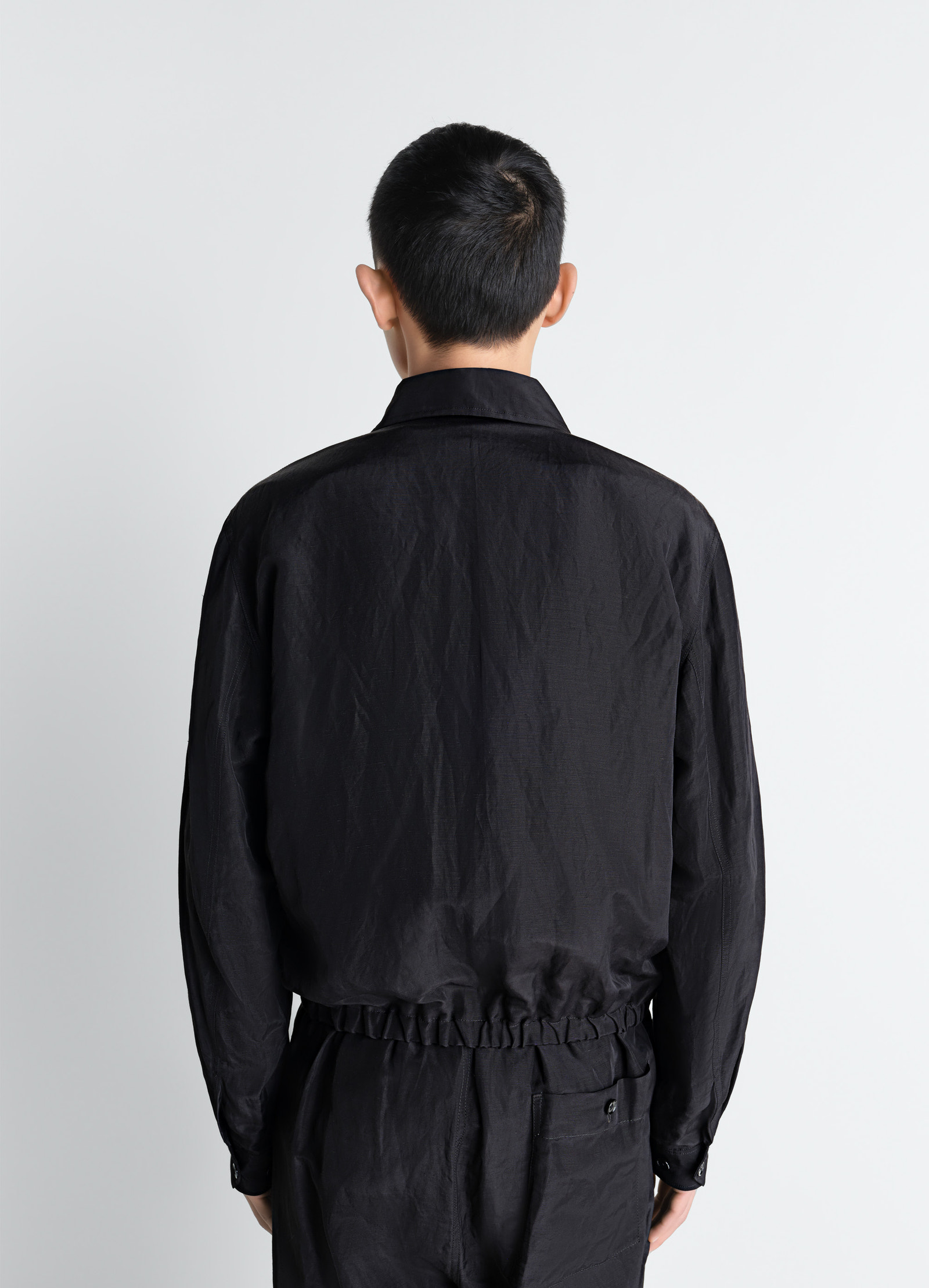 Lemaire short blouson in linen viscose, model shot, back view elastic waist hem