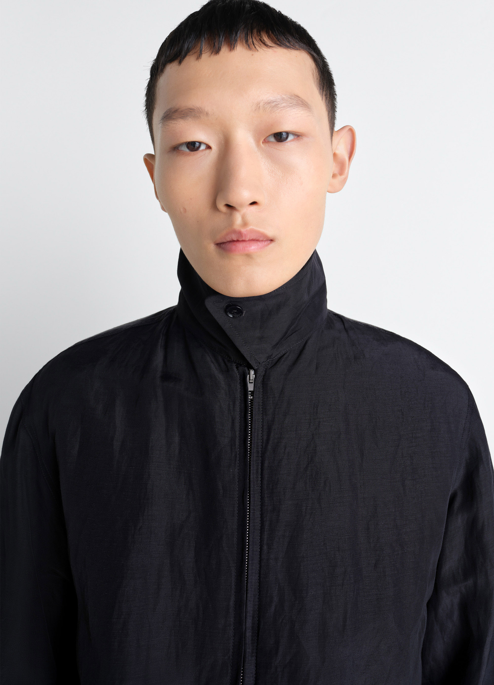 Lemaire short blouson in linen viscose, model shot, close-up front view high collar prominent