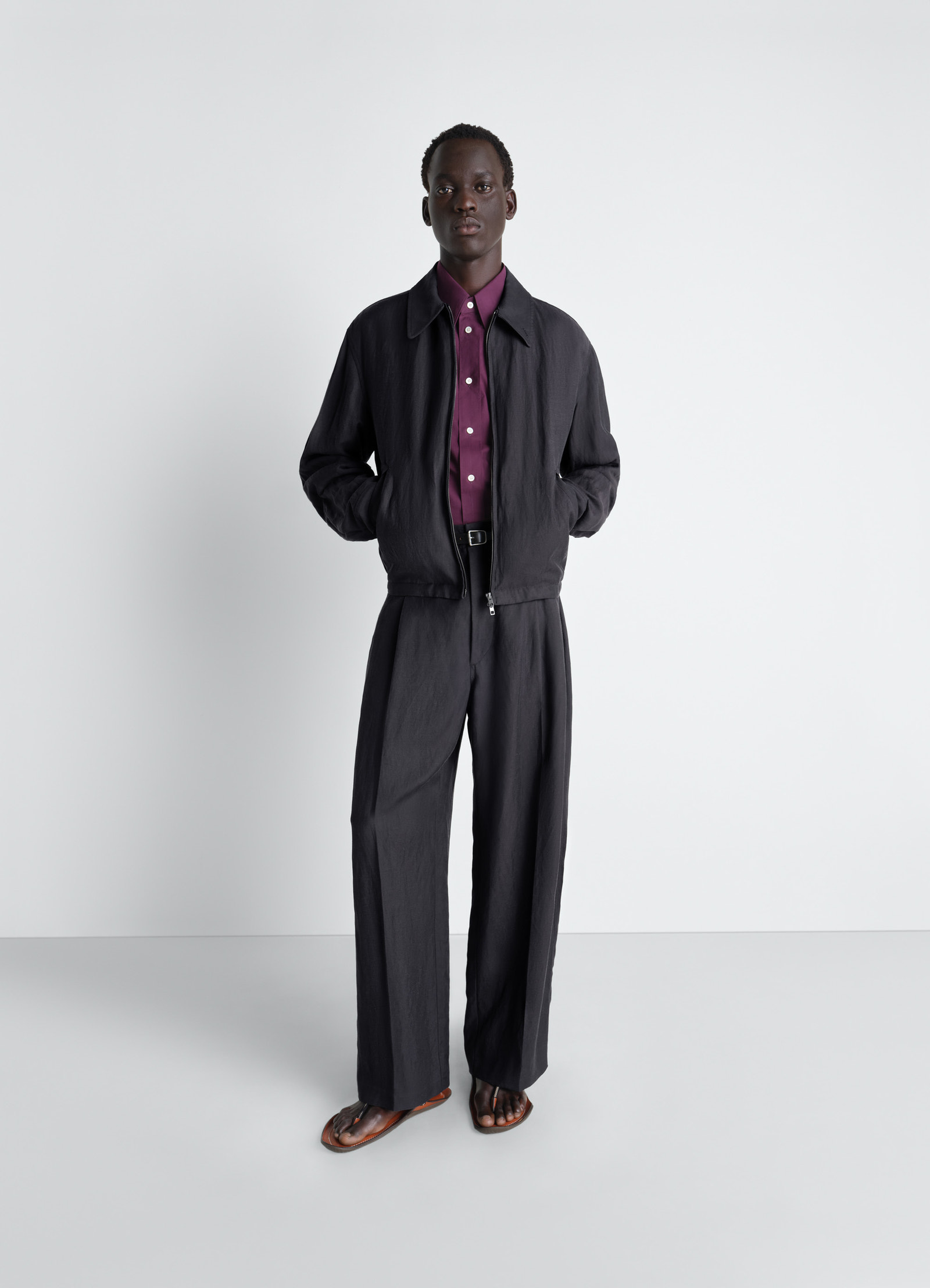Short blouson in viscose linen gabardine, model shot, full body view hands in pockets