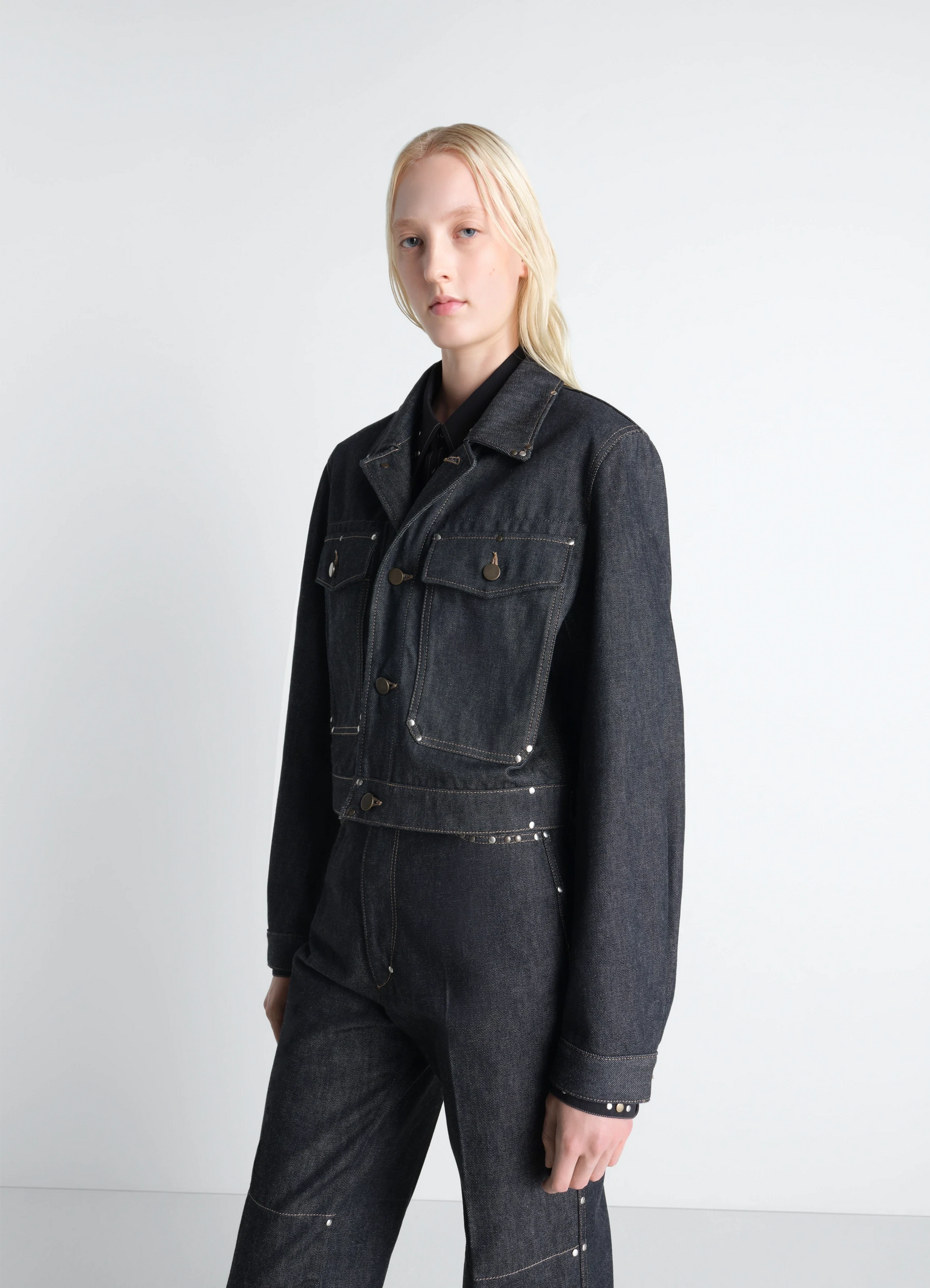 Cropped blouson with studs in slate-colored denim, model shot, front side view contemporary short fit