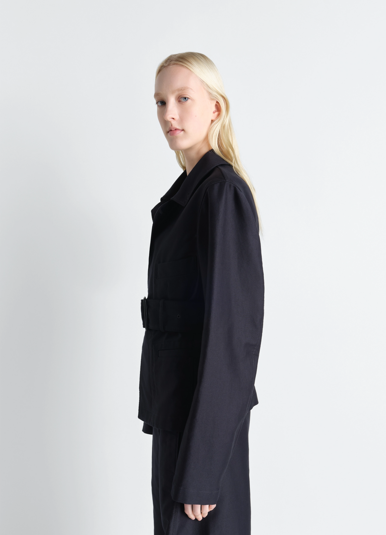 Belted utility jacket in cotton satin, model shot, side view structured shoulder design