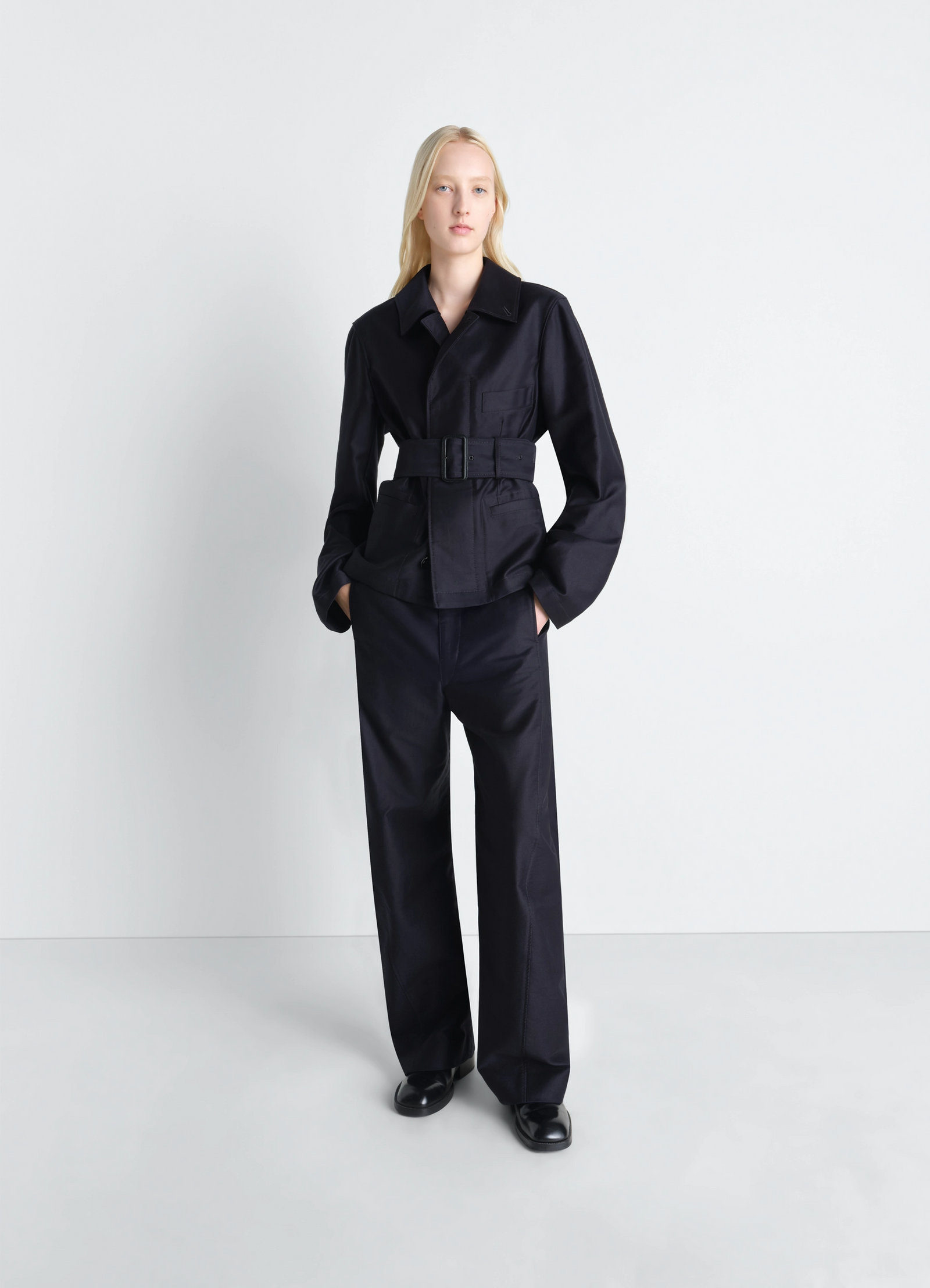 Belted utility jacket in cotton satin, model shot, three-quarter view wide-belted waist