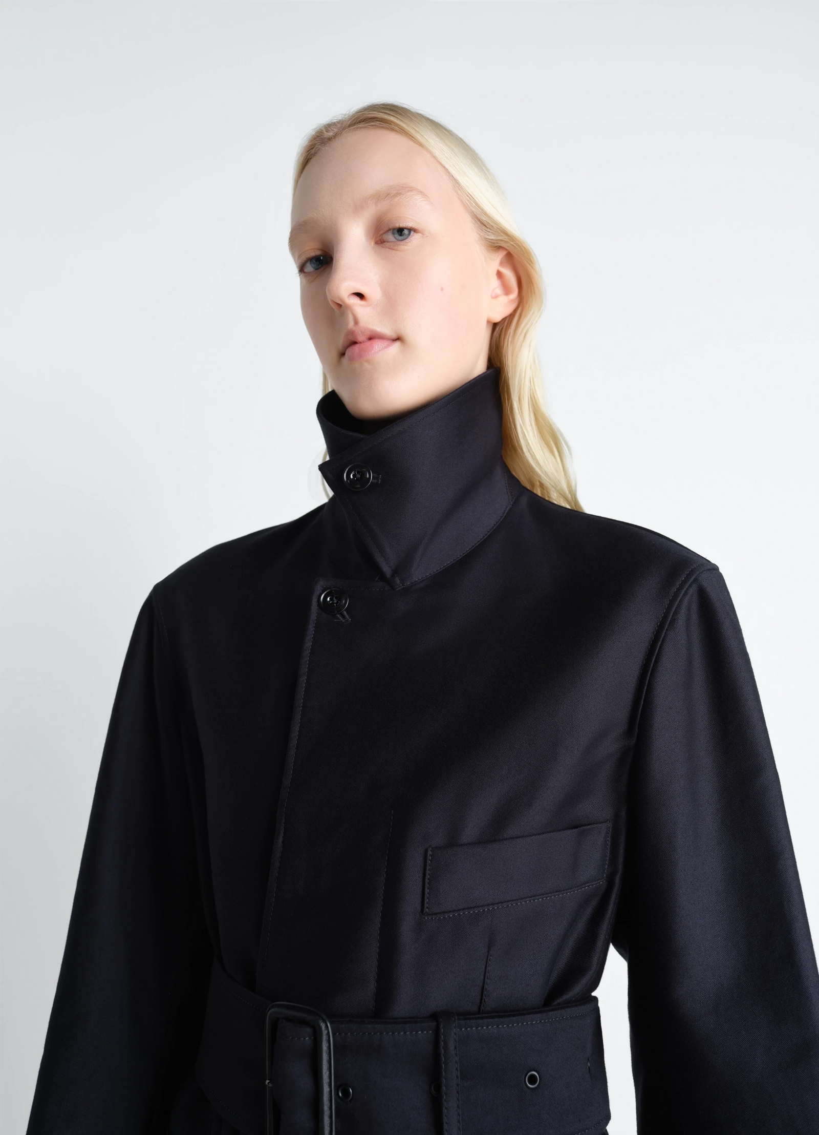 Belted utility jacket in cotton satin, model shot, close-up view high collar design