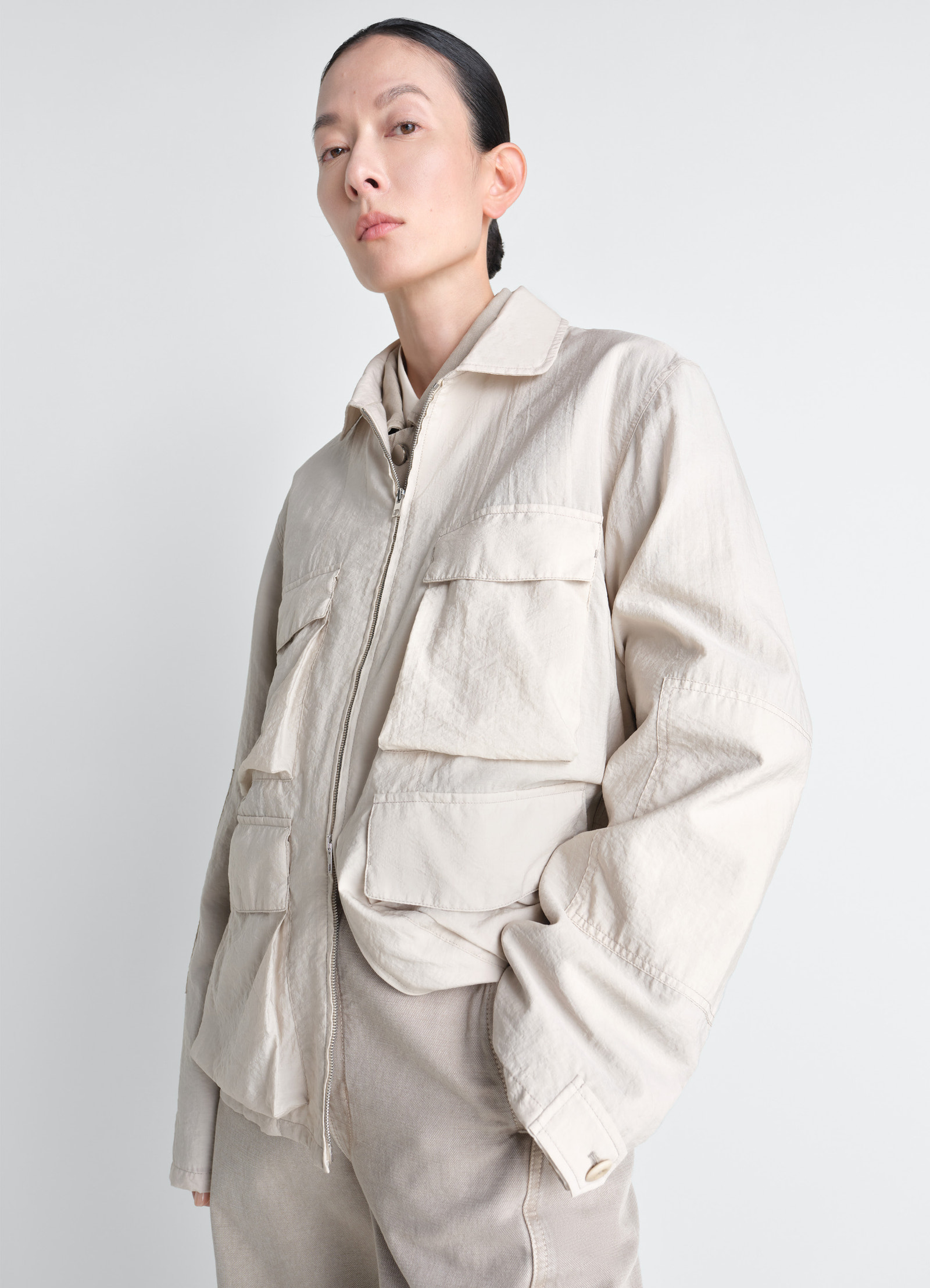 ウォッシュ加工テクニカルコットンの3dポケットジャケット