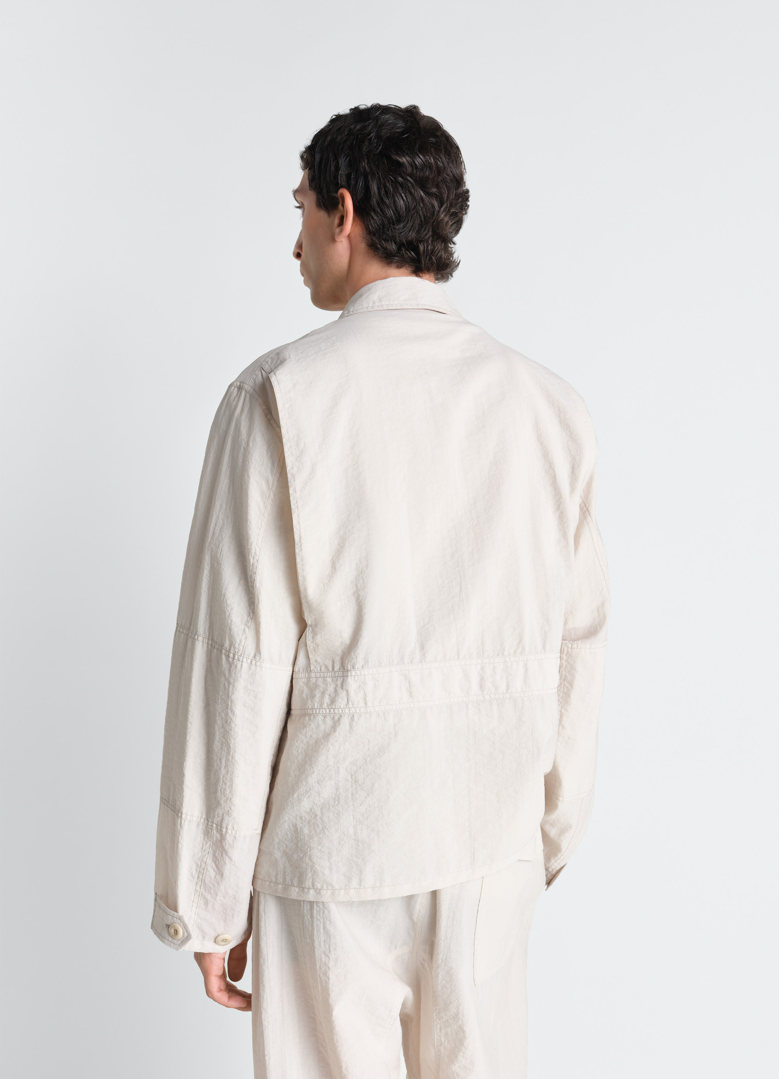 ウォッシュ加工テクニカルコットンの3dポケットジャケット