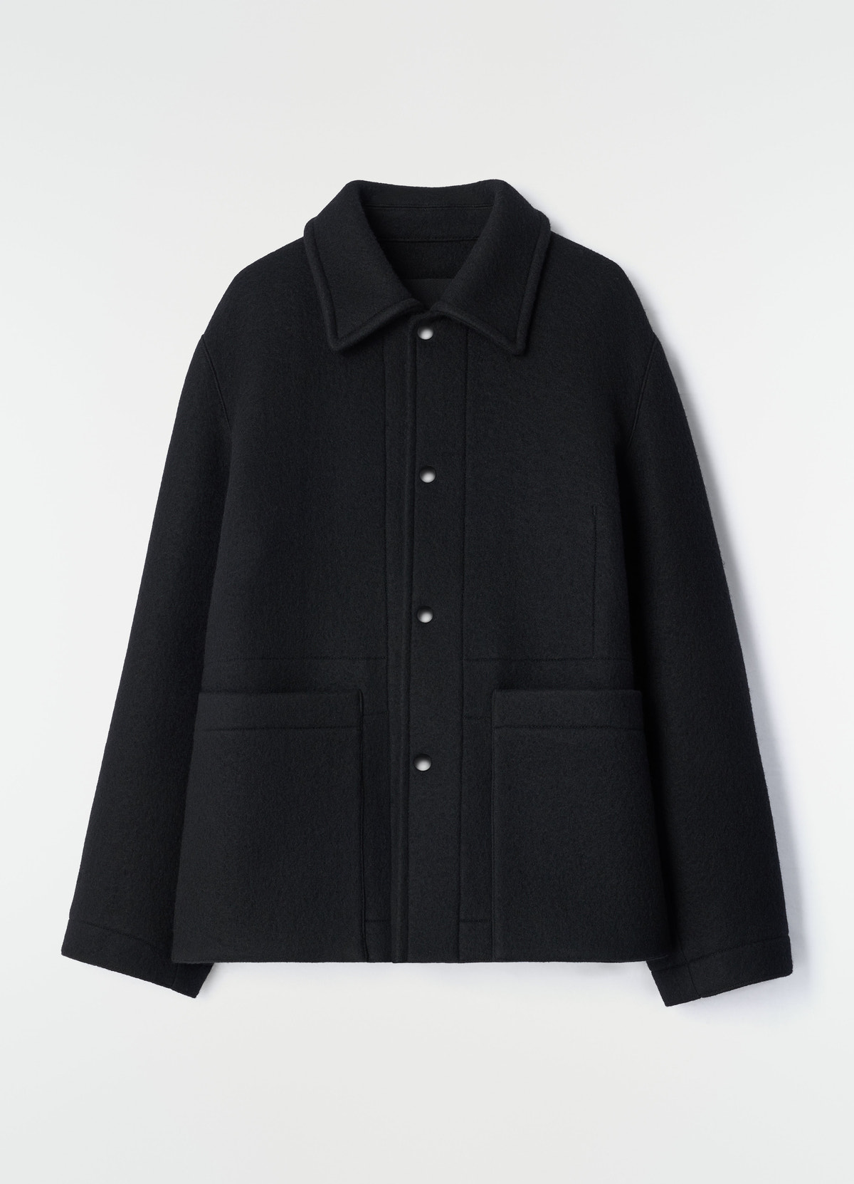 Utility jacket in black heavy wool cloth with button front and pockets lemaire plain white background