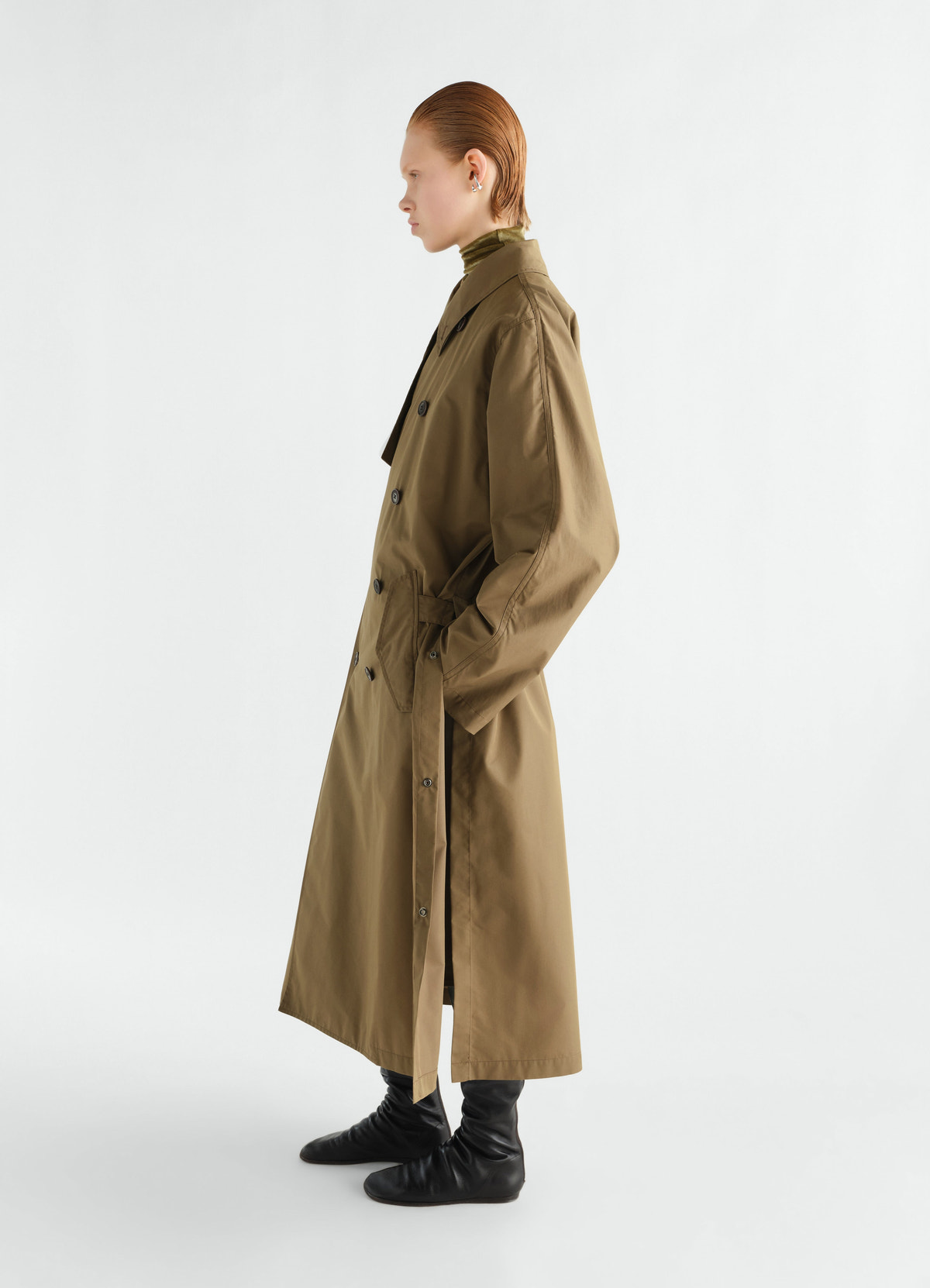 Light brown water-repellent cotton gabardine trench coat by lemaire worn by a model side view