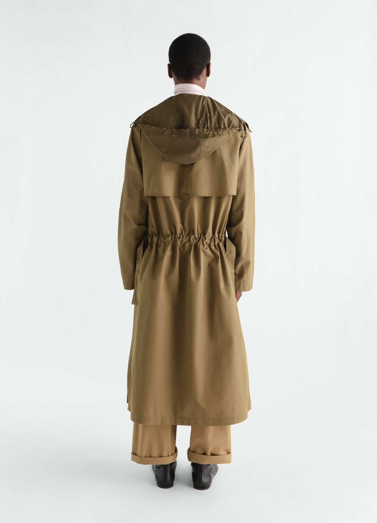 Light brown water-repellent cotton gabardine trench coat by lemaire worn by model back view