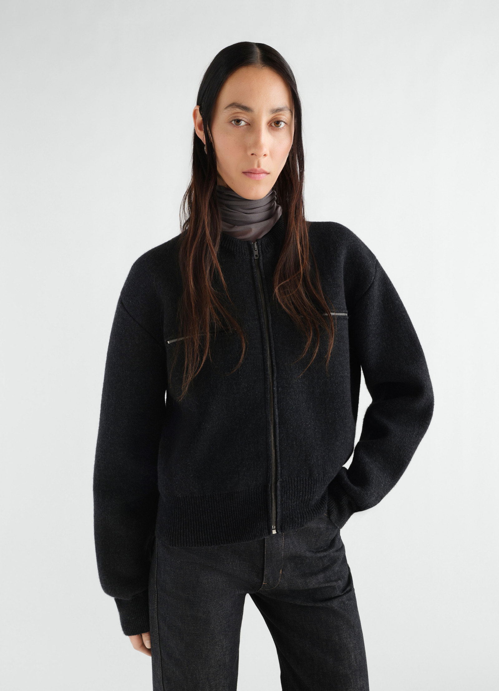Zipped alpaca wool blend black top lemaire worn by a model front view with long sleeves and zip closure