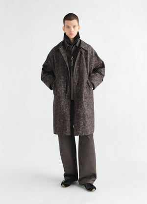 Military parka in brown storm printed cotton by lemaire worn by model front view full body