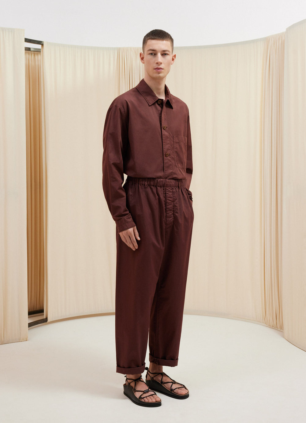Lemaire Relaxed Pants in Garment Dyed Satin Brown, model shot, front view pyjama-like fit