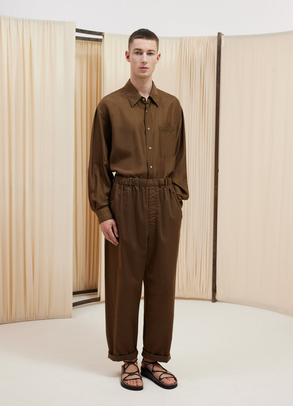 Lemaire Relaxed Pants in Garment Dyed Satin, model shot, Front view Pyjama-like relaxed fit