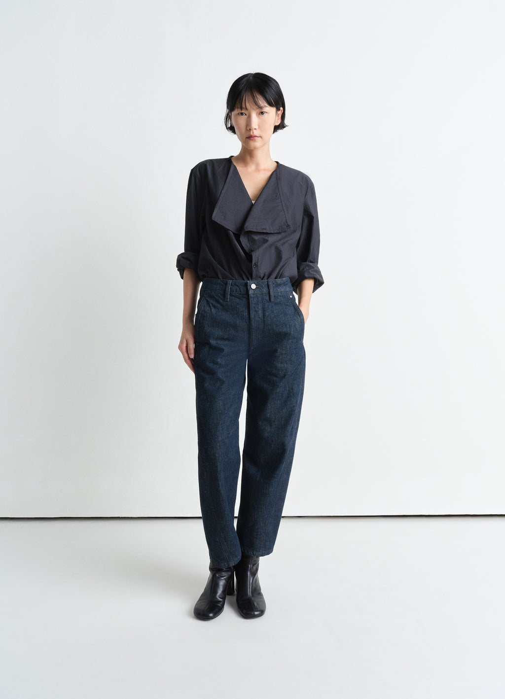 Lemaire Twisted Pants in Deep Indigo Heavy Denim, model shot, Front view Straight cut, workwear details