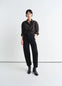 Lemaire Twisted Pants in Deep Black Heavy Denim, model shot, Front view Straight cut with twist seams