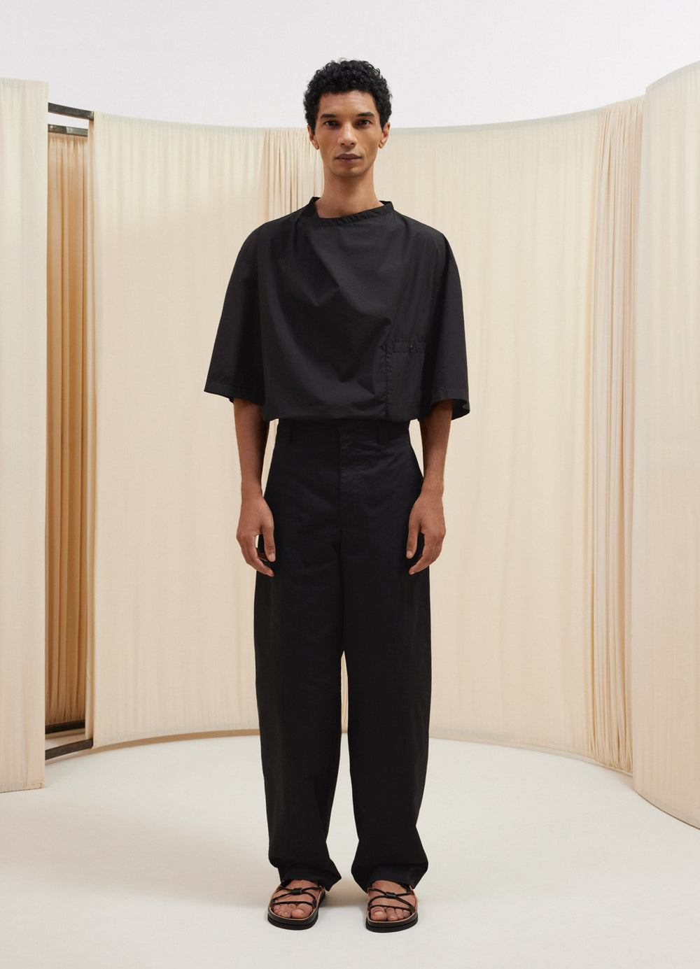 Lemaire Maxi Pants in Black Virgin Wool Linen, model shot, front view wide fit slightly tapered