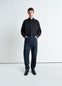 Twisted Workwear Pants in Deep Indigo Heavy Denim, model shot, Front view Twisted side seams