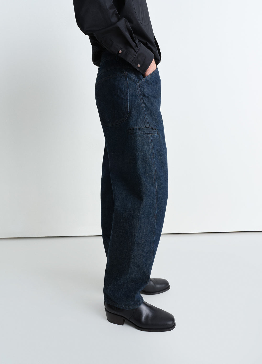 Twisted Workwear Pants in Deep Indigo Heavy Denim, model shot, side view relaxed fit