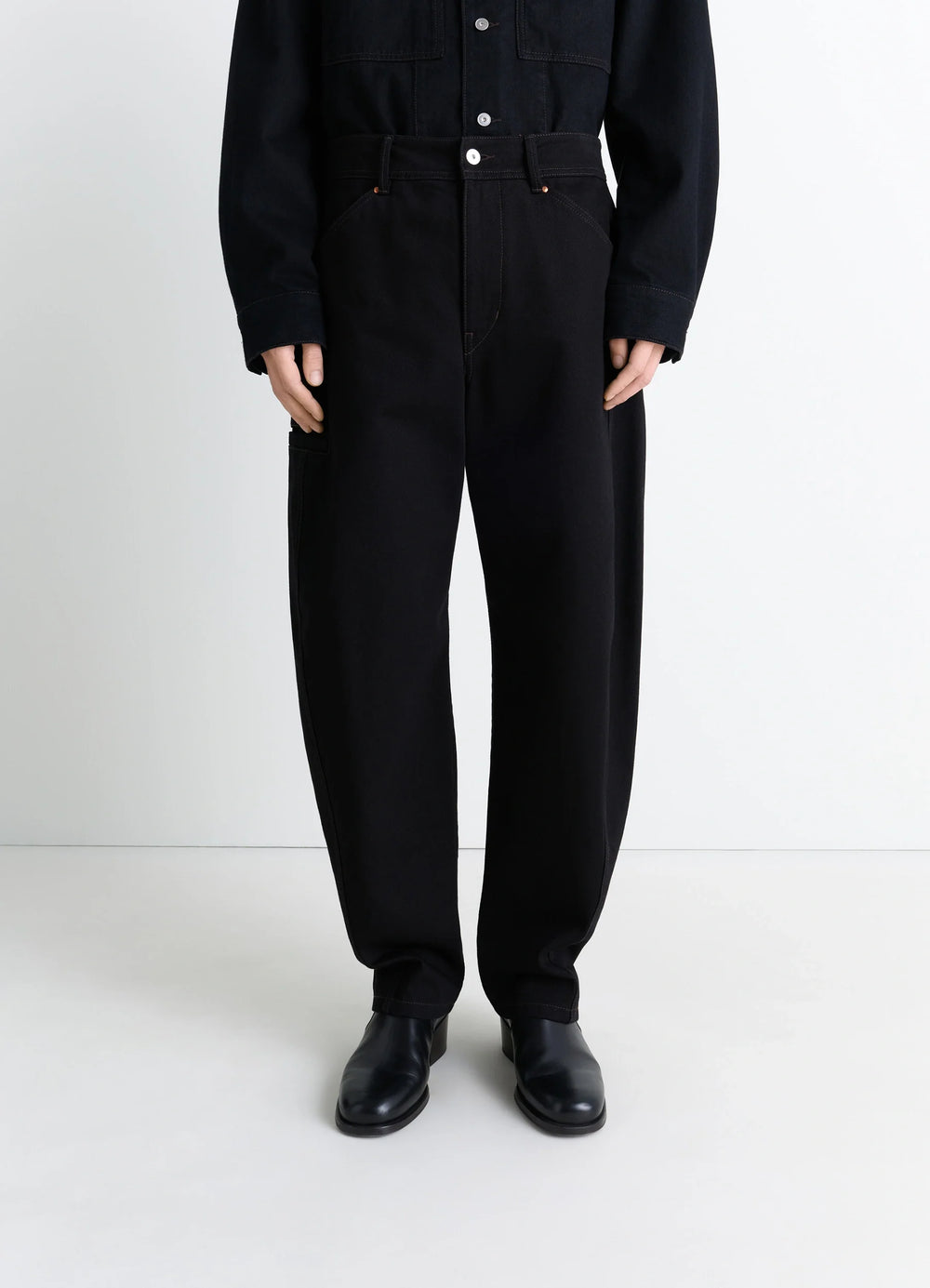 Lemaire Twisted Workwear Pants in Deep Black Thick Denim, model shot, front midsection view straight leg cut