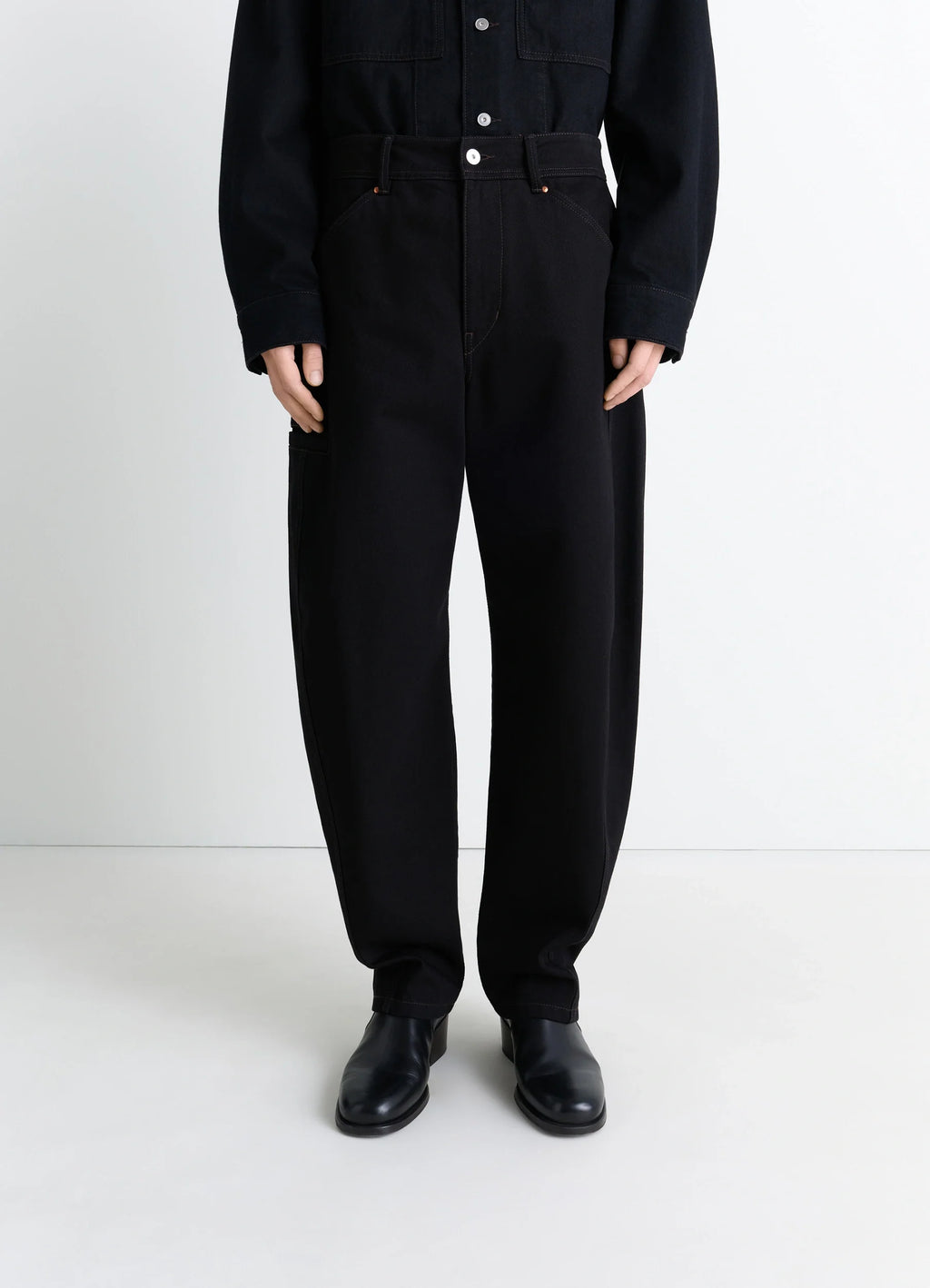 Lemaire Twisted Workwear Pants in Deep Black Thick Denim, model shot, front midsection view straight leg cut
