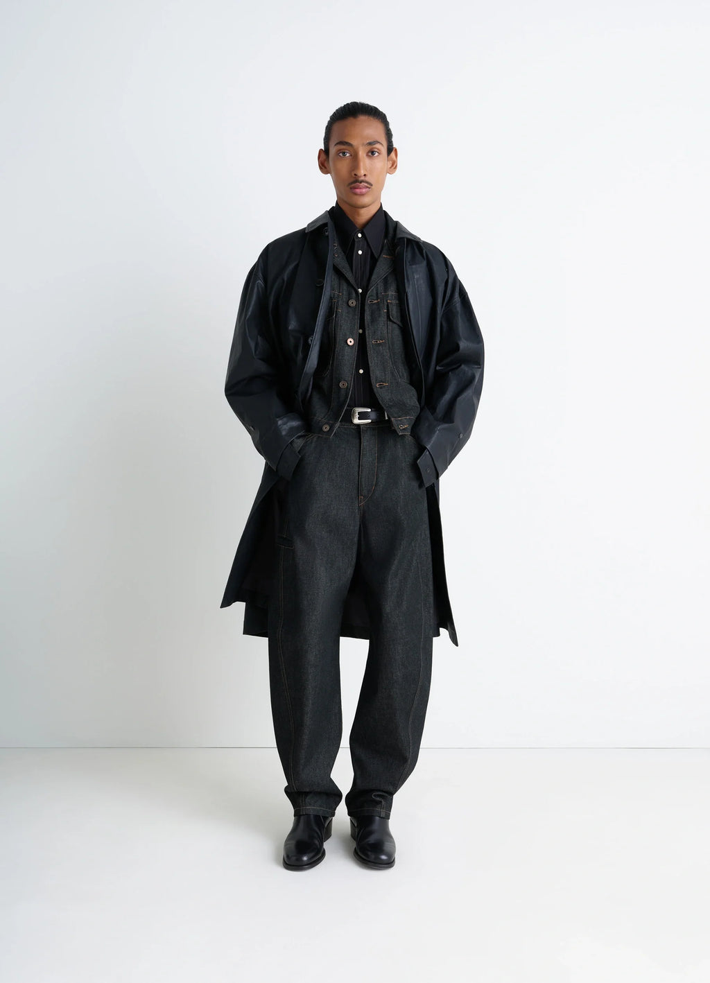Lemaire Twisted Workwear Pants in Slate Denim, model shot, Front view Twisted seams, rounded leg