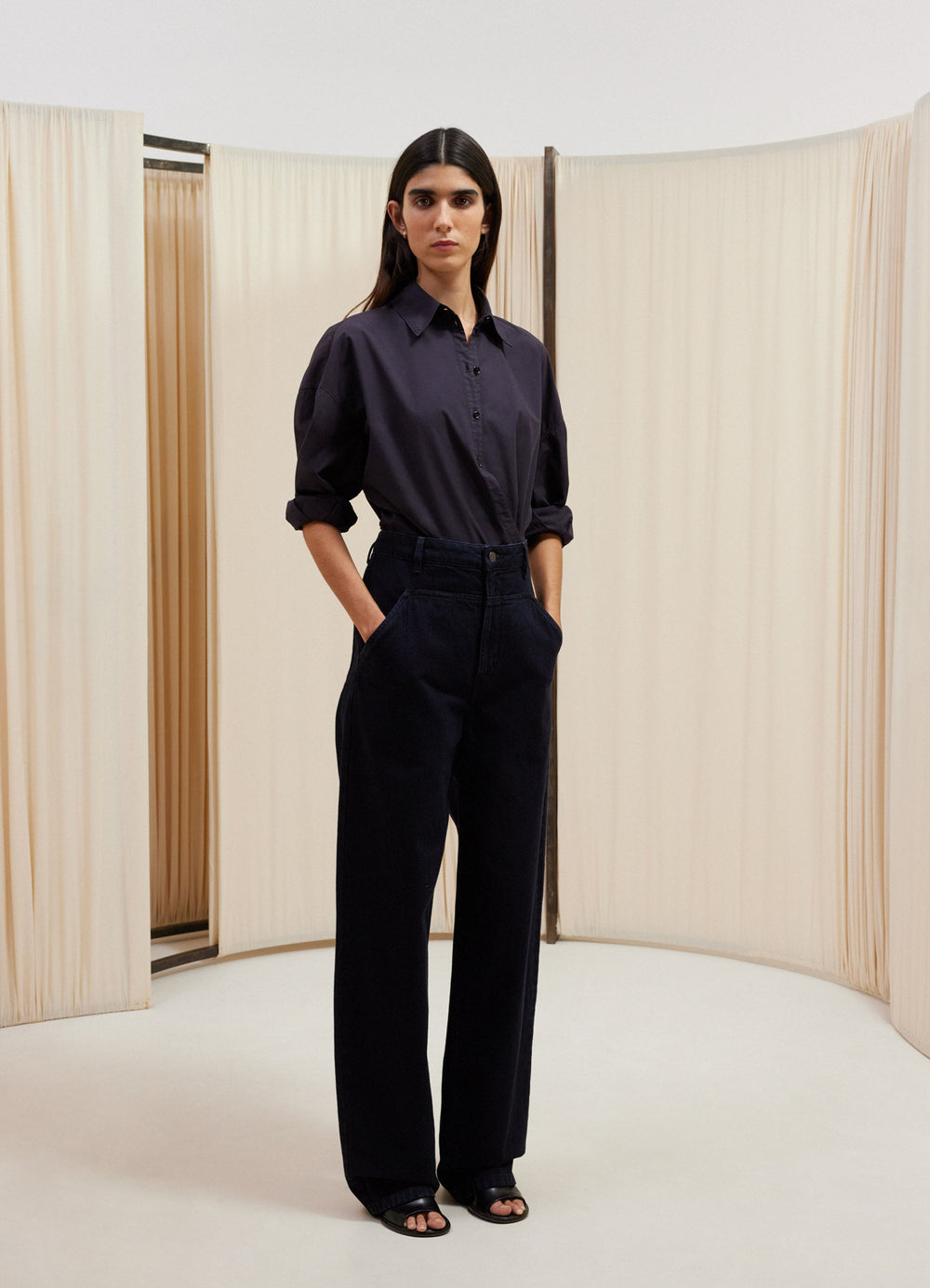 Lemaire Carpenter Pants in Heavy Indigo Wash Denim, model shot, front view straight cut low-rise