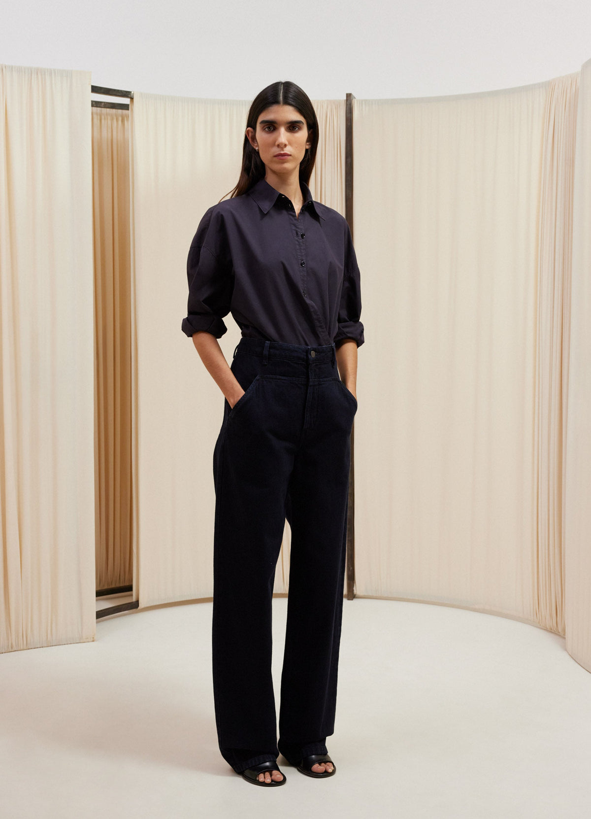 Lemaire Carpenter Pants in Heavy Indigo Wash Denim, model shot, front view straight cut low-rise