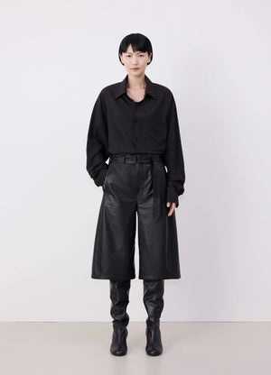 Lemaire Leather Bermuda Shorts in Nappa Cow Leather, model shot, Front view Relaxed fit with belt