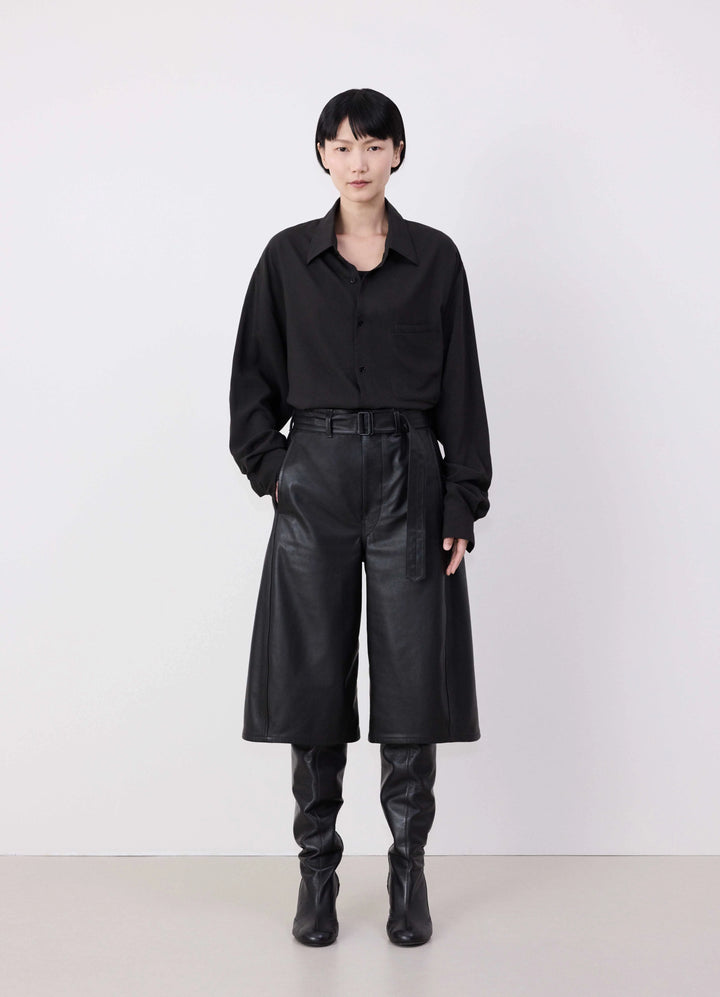 Lemaire Leather Bermuda Shorts in Nappa Cow Leather, model shot, Front view Relaxed fit with belt