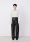 Lemaire Drawstring Parachute Pants in Black Ultra-fine Lamb Leather, model shot, Front view Wide leg, relaxed silhouette