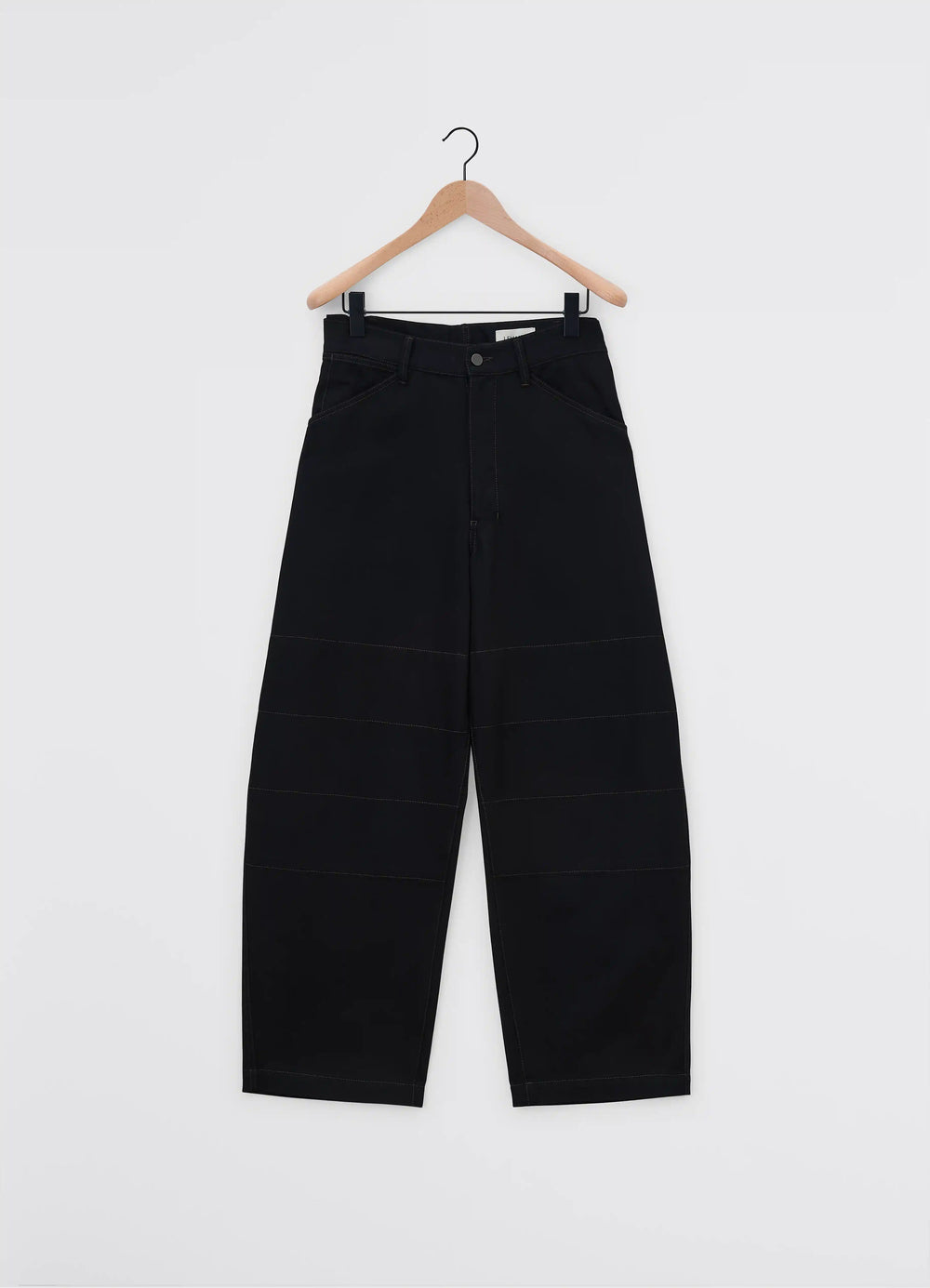 Lemaire Judo Pants in Heavy Yarn Dyed Black Denim, product shot, hanging view structured waistband