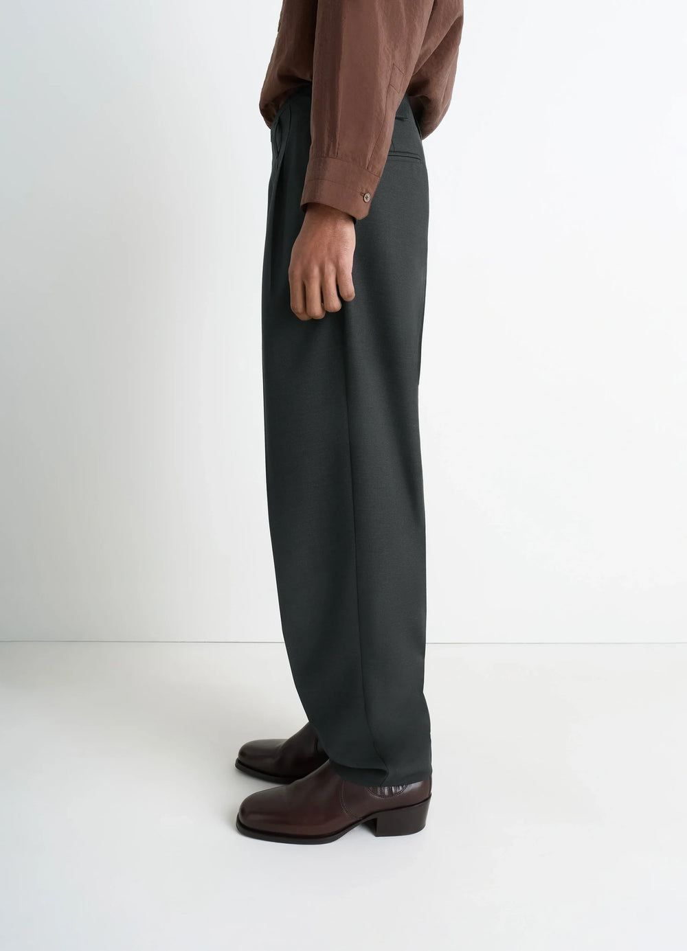 Lemaire Pleated Pants in Tropical Wool-Blend, model shot, half side view draped fabric