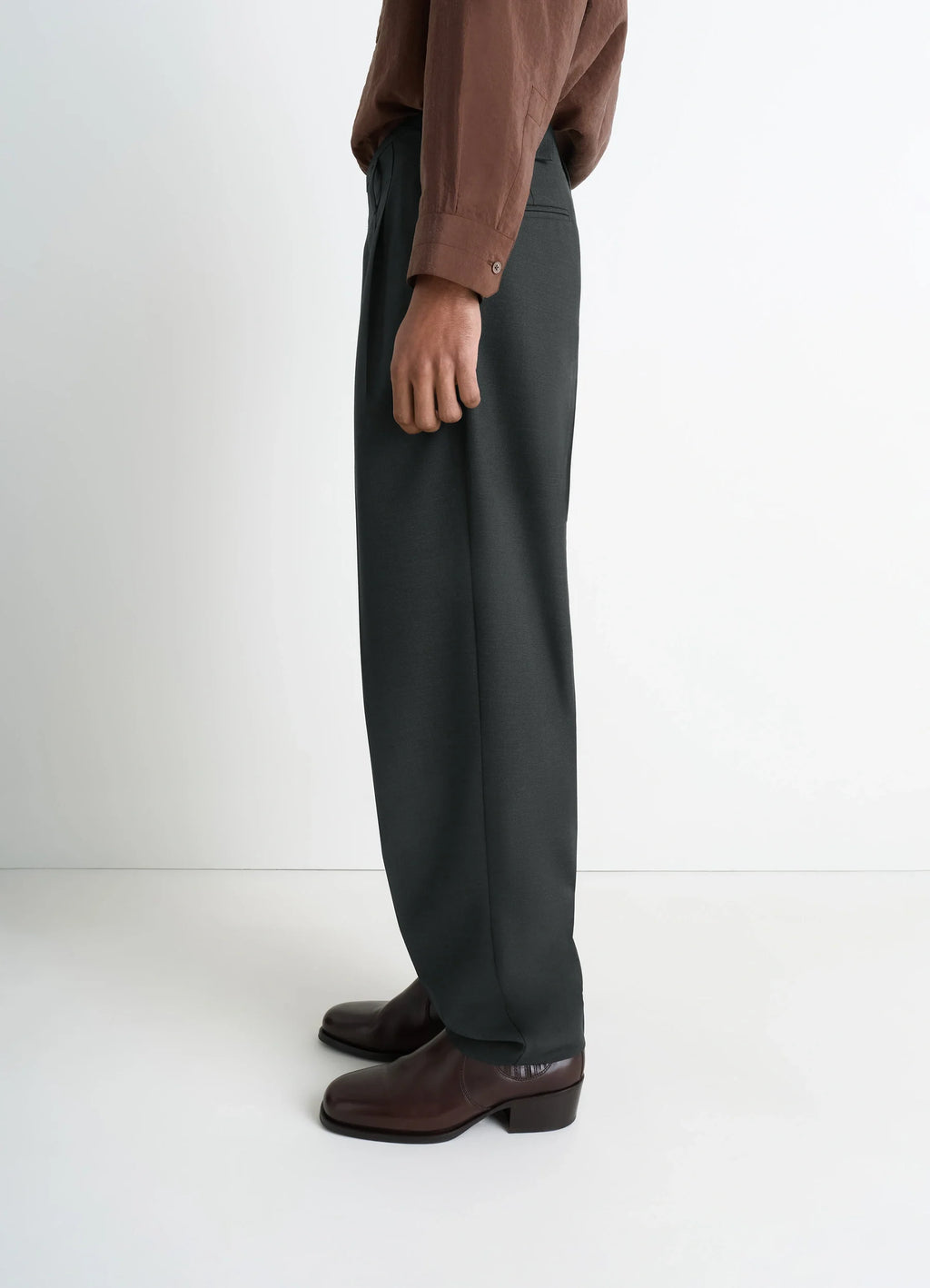 Lemaire Pleated Pants in Tropical Wool-Blend, model shot, half side view draped fabric