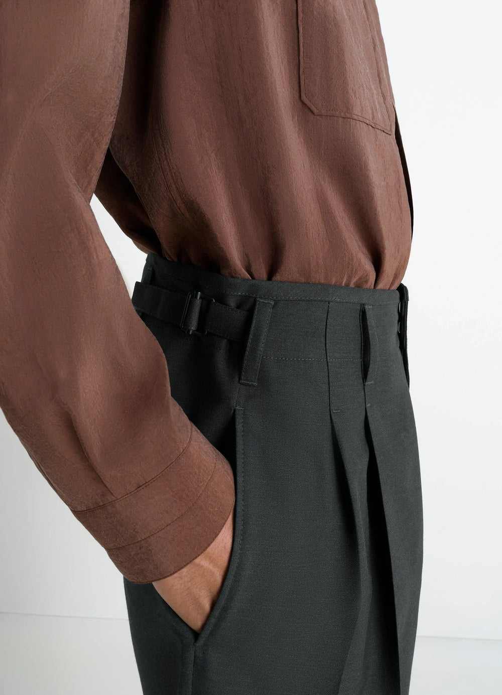 Lemaire Pleated Pants in Tropical Wool-Blend, model shot, close-up profile view waist fit with buckle detail