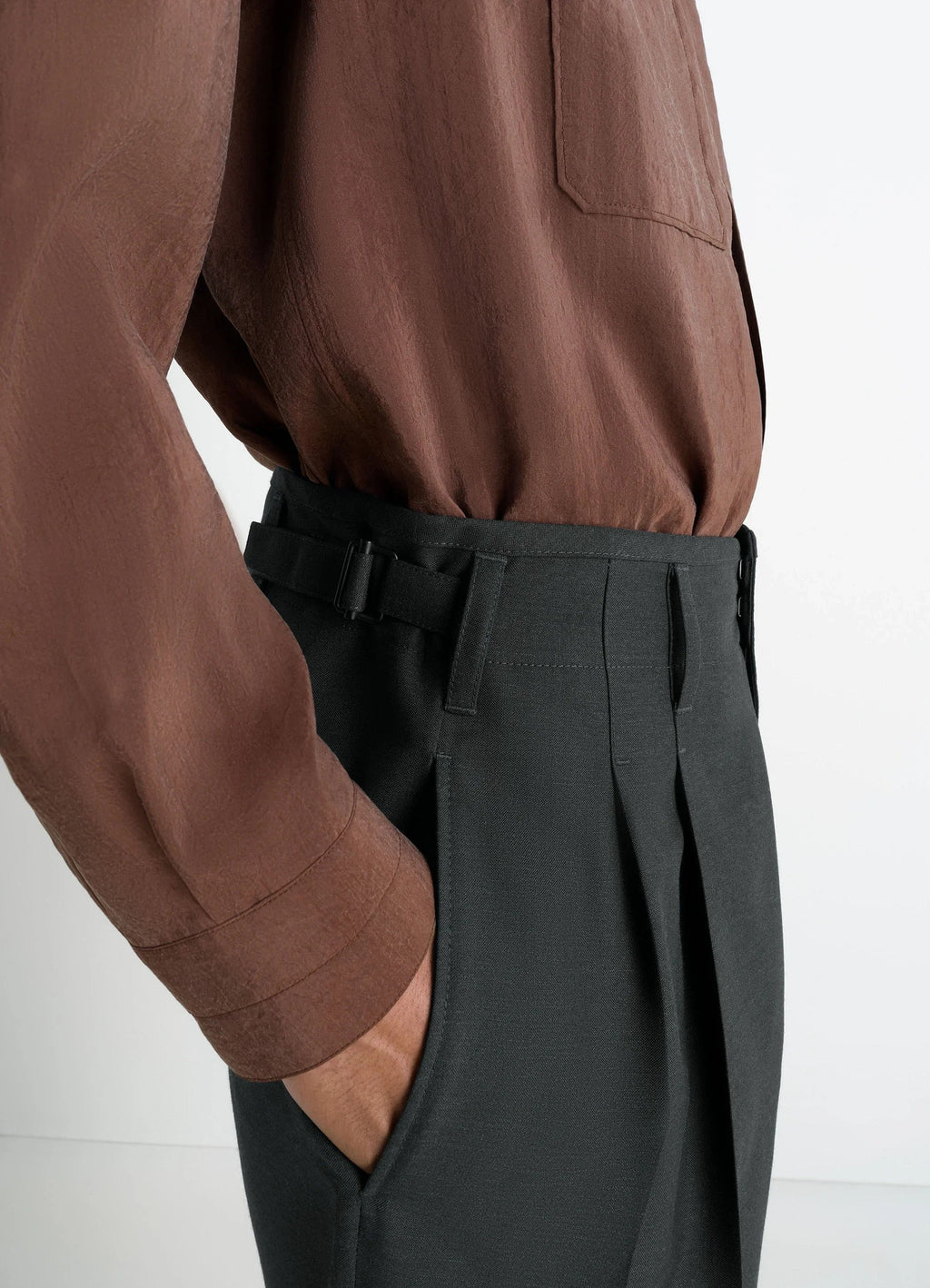 Lemaire Pleated Pants in Tropical Wool-Blend, model shot, close-up profile view waist fit with buckle detail