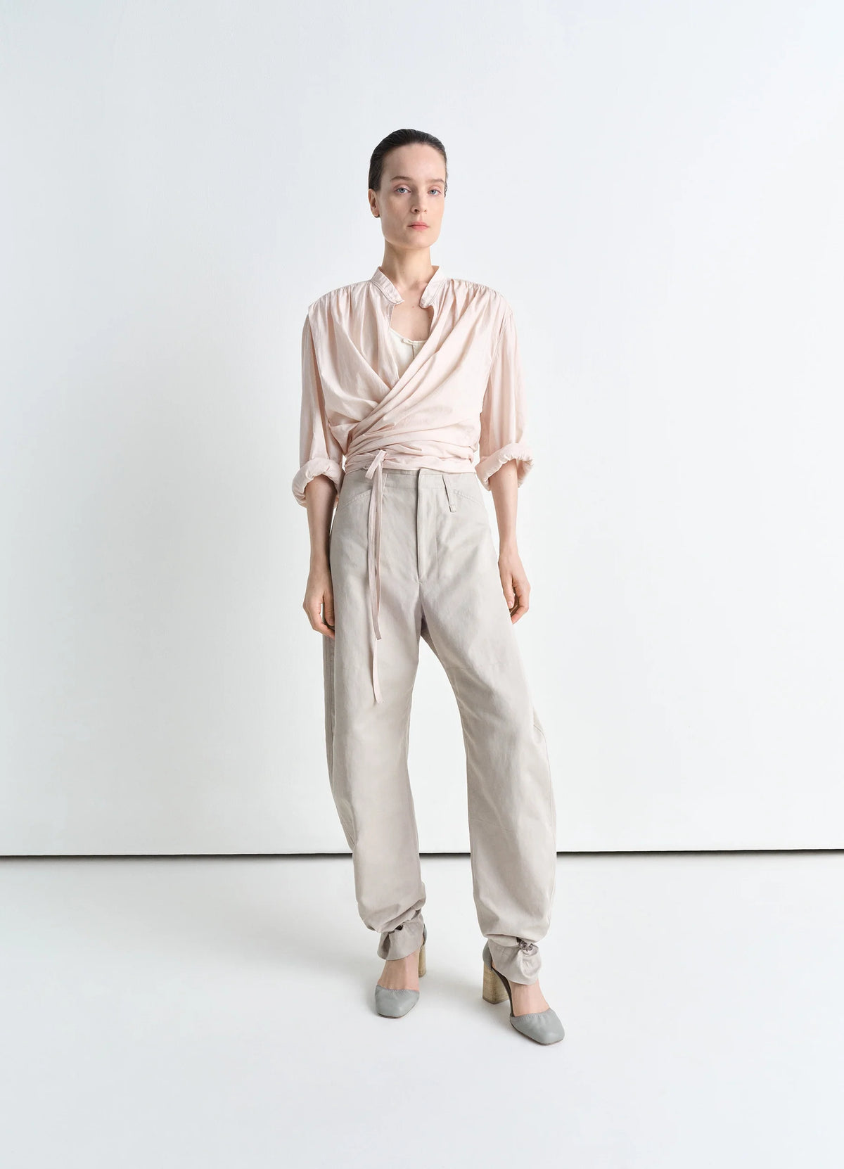 Lemaire Tapered Pants in Beige Cotton Linen Gabardine, model shot, Front view Curved leg tapered fit