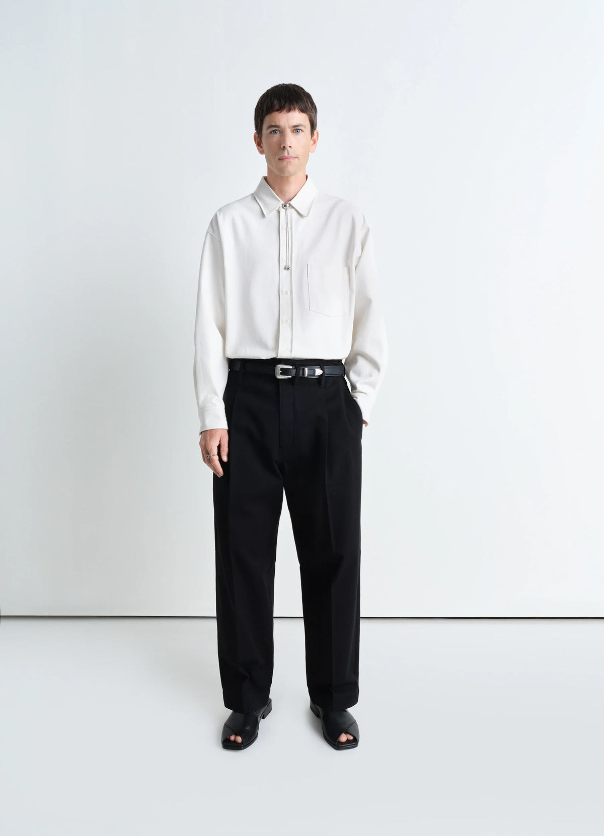 Lemaire Pleated Carrot Pants in Heavy Cotton Drill, model shot, Front view Deep pleat, wide leg