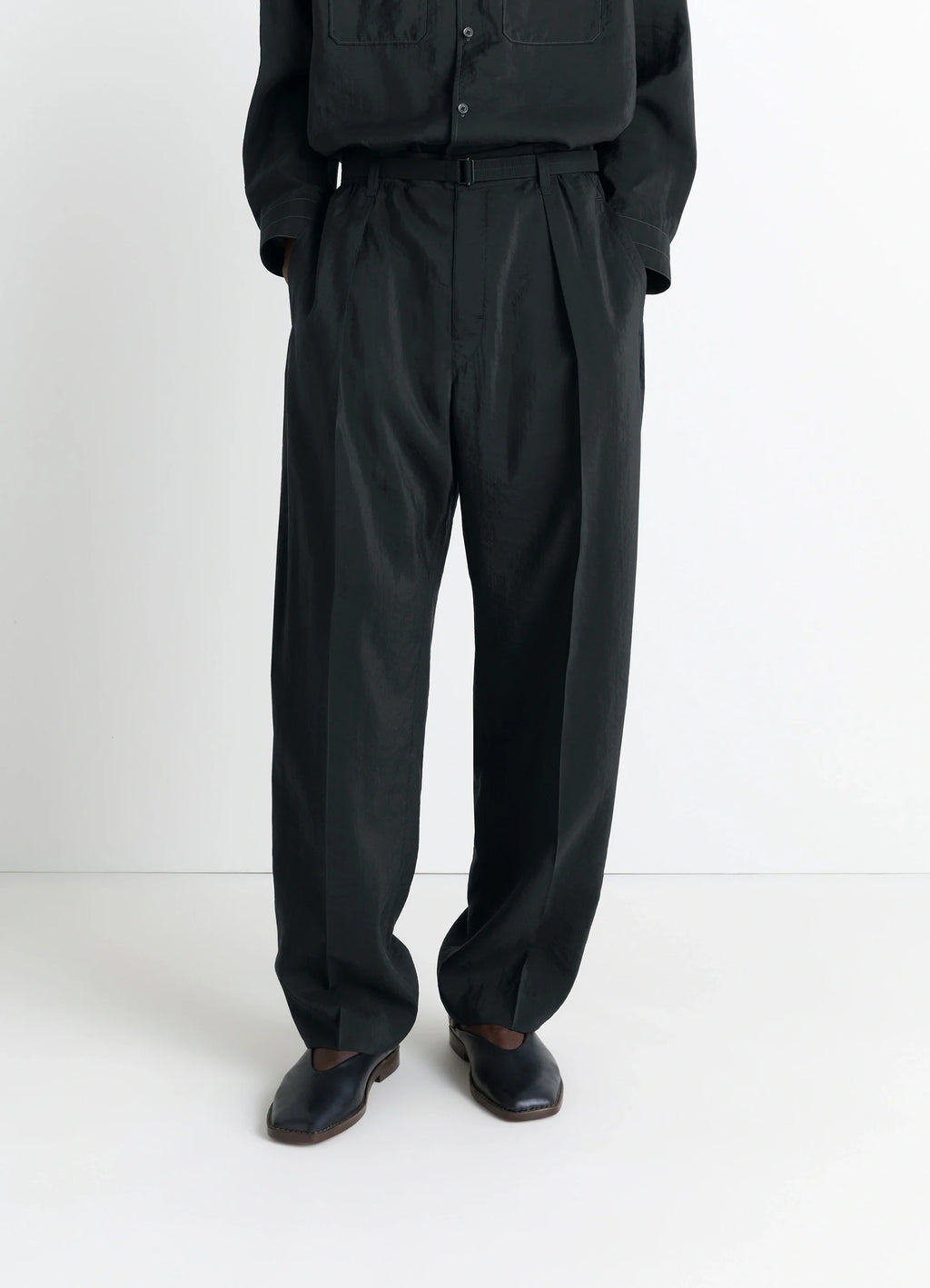 Lemaire Belted Relaxed Pants in Black Dry Silk Blend, model shot, Front view Relaxed fit with belt