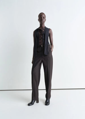 Lemaire belted tailored pants in mottled tropical poly-wool, model shot, front view straight cut tapered leg