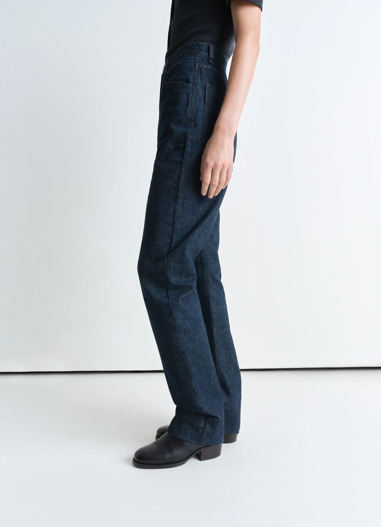 Lemaire dropped crotch pants in heavy indigo denim, model shot, side view straight leg