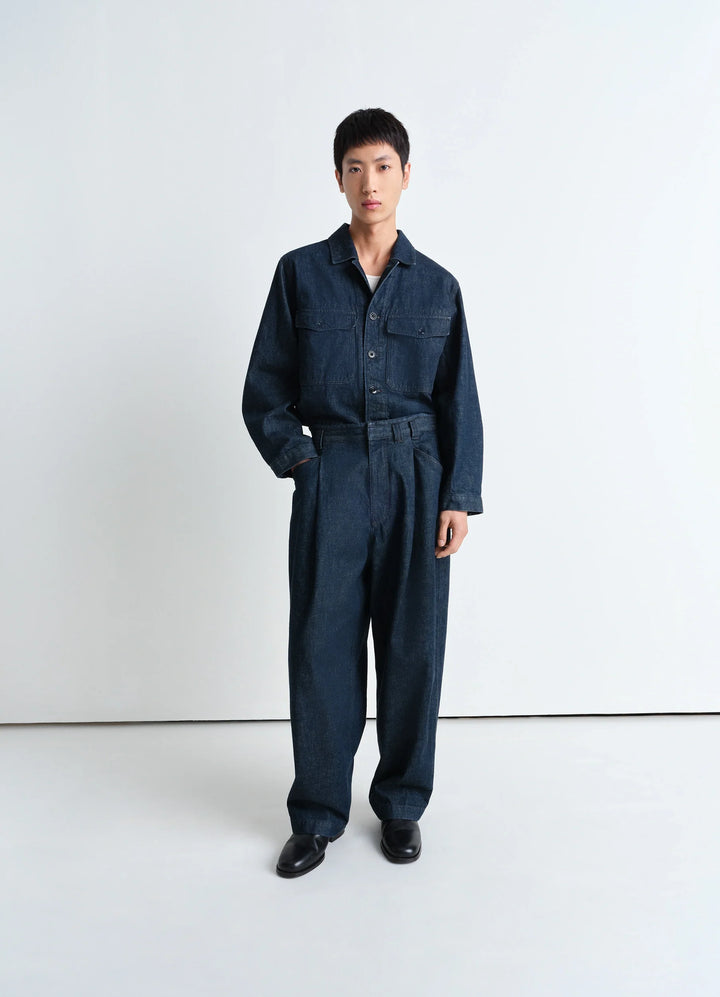 Lemaire Pleated Workwear Pants in Deep Indigo Heavy Denim, model shot, Front view Relaxed tapered leg