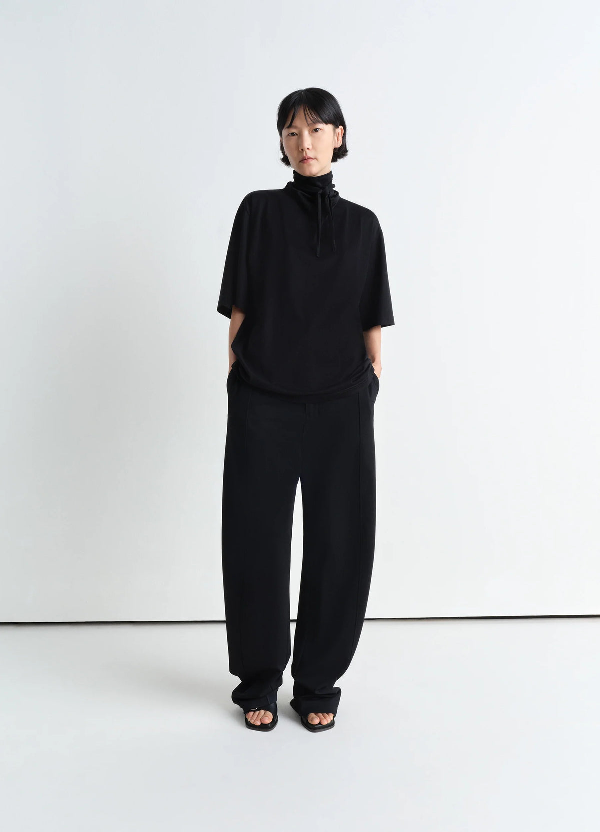 Relaxed Volume Pants in Black viscose silk, model shot, Front view Wide leg, mid-waist