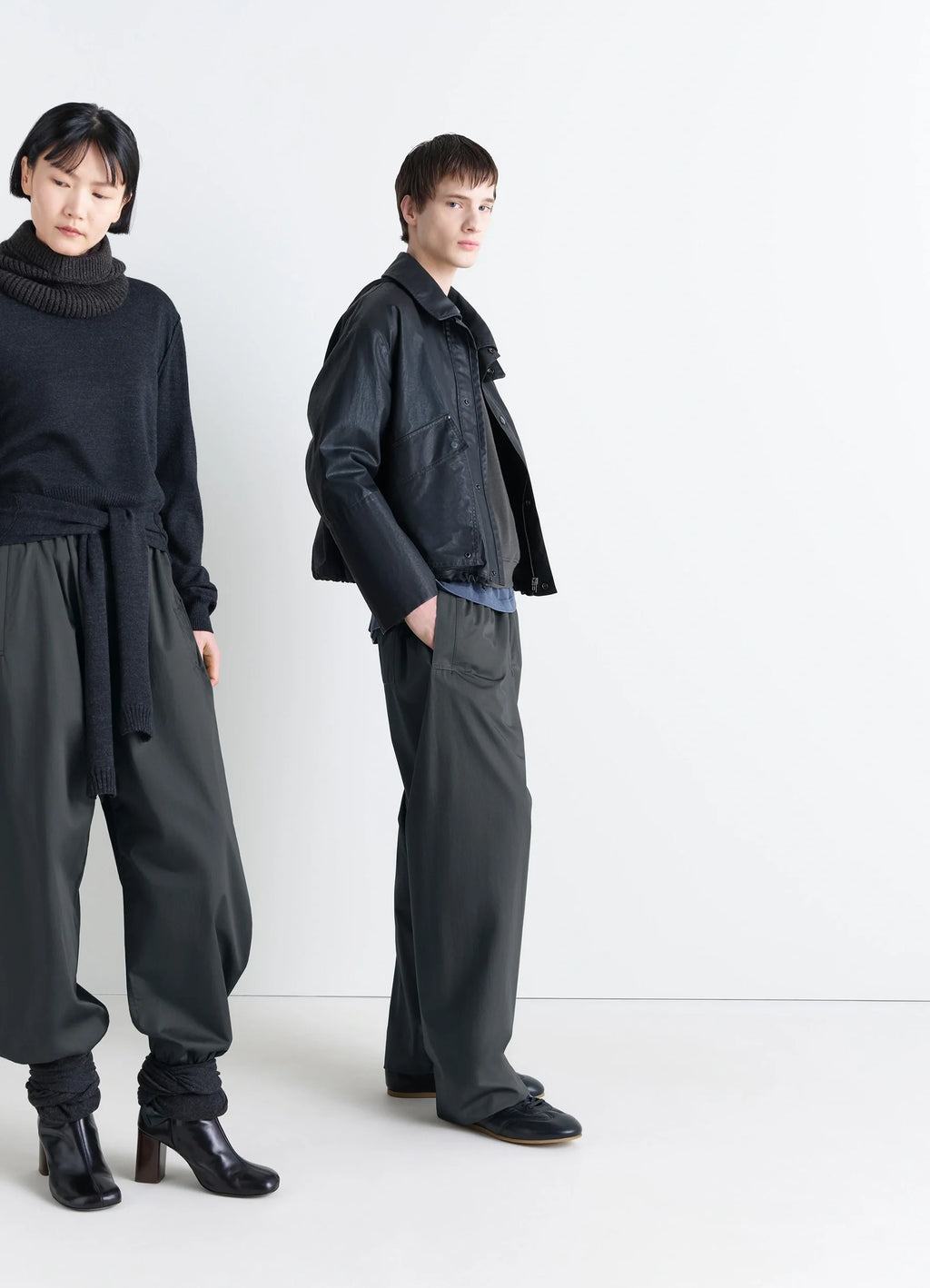 Lemaire Pyjama Pants in Garment Dyed Satin, model shot, side view wide leg design