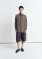 Lemaire Maxi Pleated Bermuda in Grey compact cotton twill, model shot, front view relaxed fit