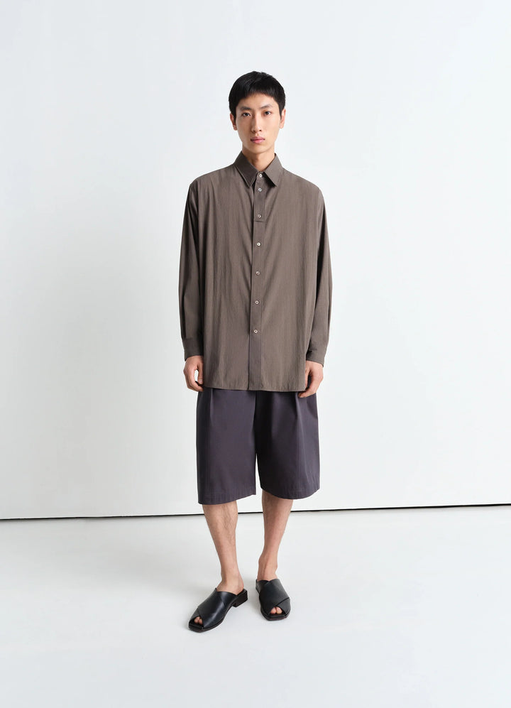 Lemaire Maxi Pleated Bermuda in Grey compact cotton twill, model shot, front view relaxed fit