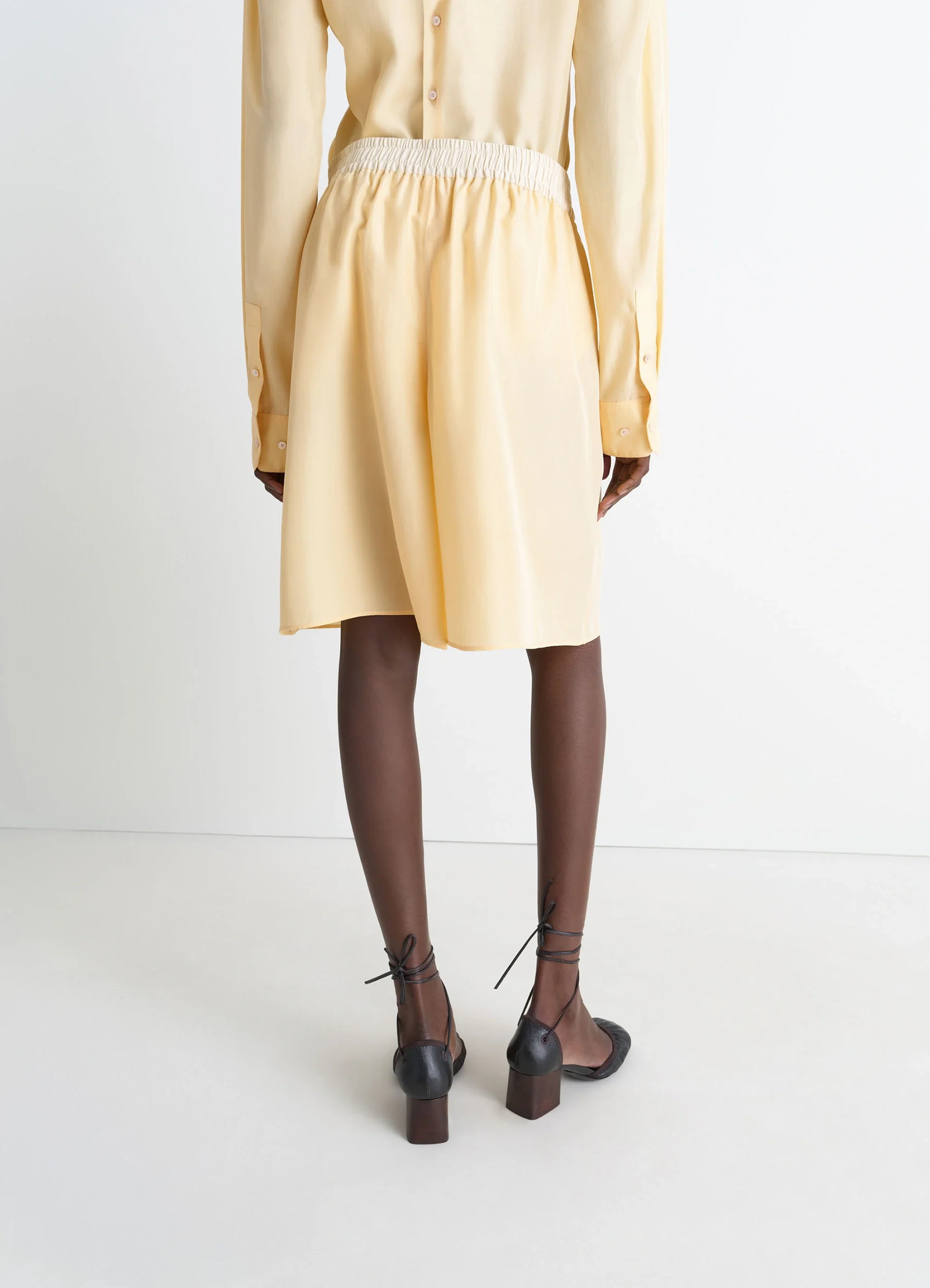 Lemaire soft shorts in silk pongee, model shot, back view elastic waistband