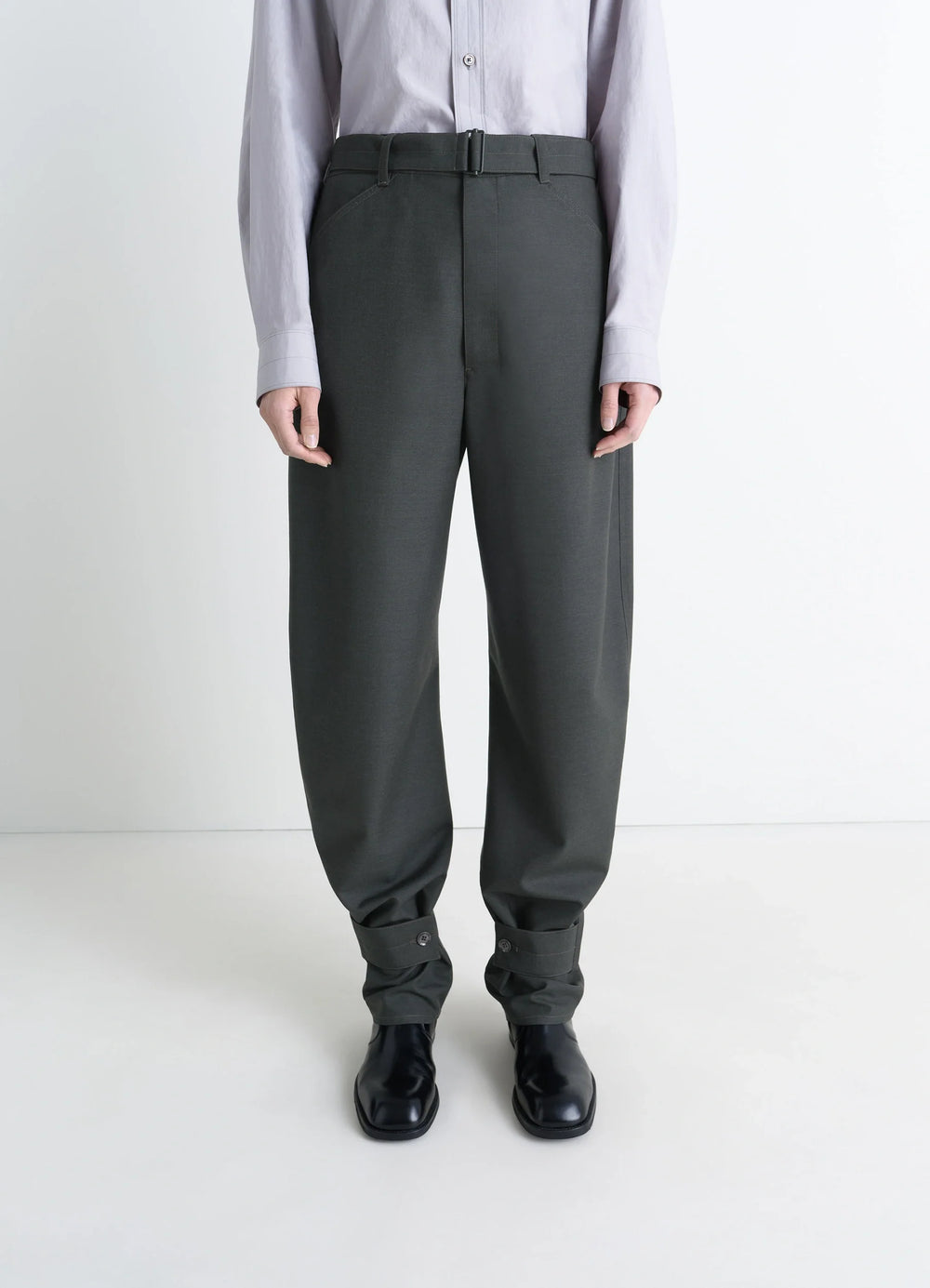 Lemaire Curved Tailored Pants in Tropical Wool Blend, model shot, front detail cropped buttoned cuff