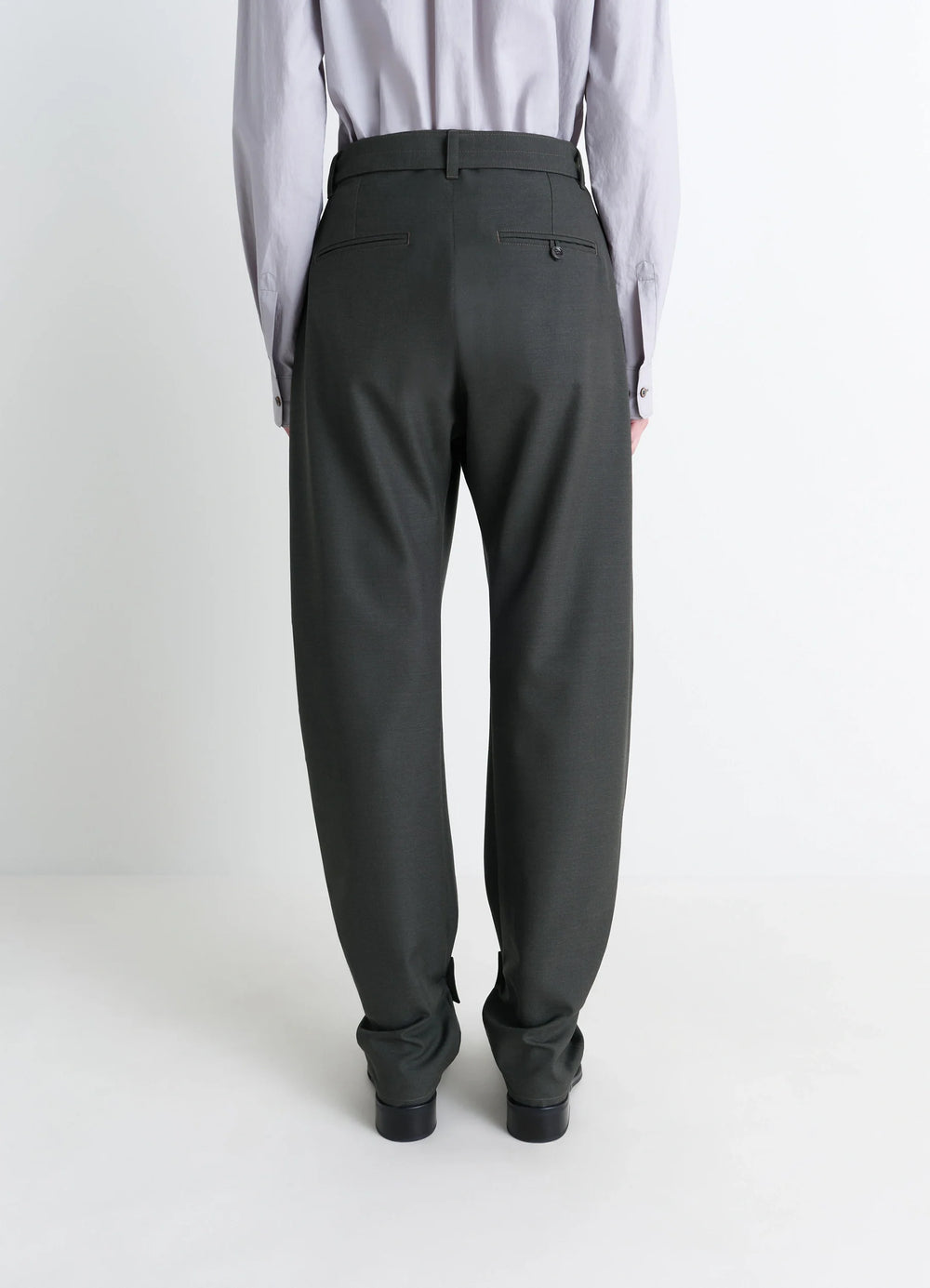 Lemaire Curved Tailored Pants in Tropical Wool Blend, model shot, back view tapered leg