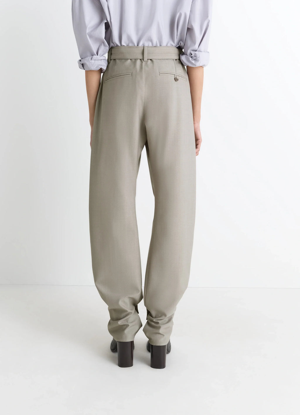 Lemaire Curved Tailored Pants in Tropical Wool Blend, model shot, back view cropped hem detail